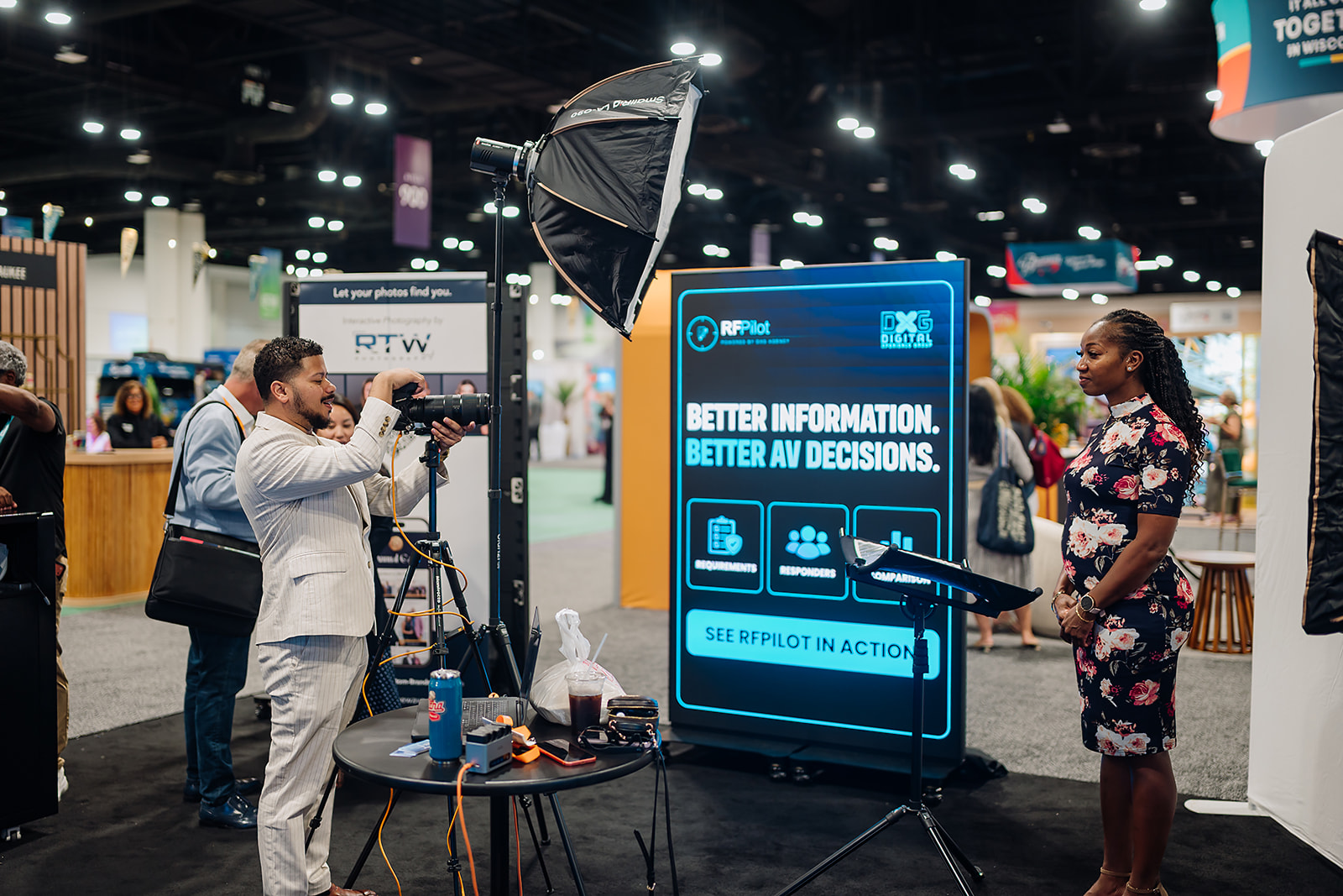 Headshot lounge station with studio lighting on a conference expo floor